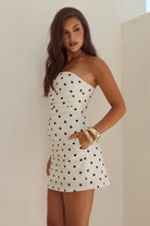 Cairo Mini Dress in White/Black Polka Side Profile | Winsome Girl Fashion