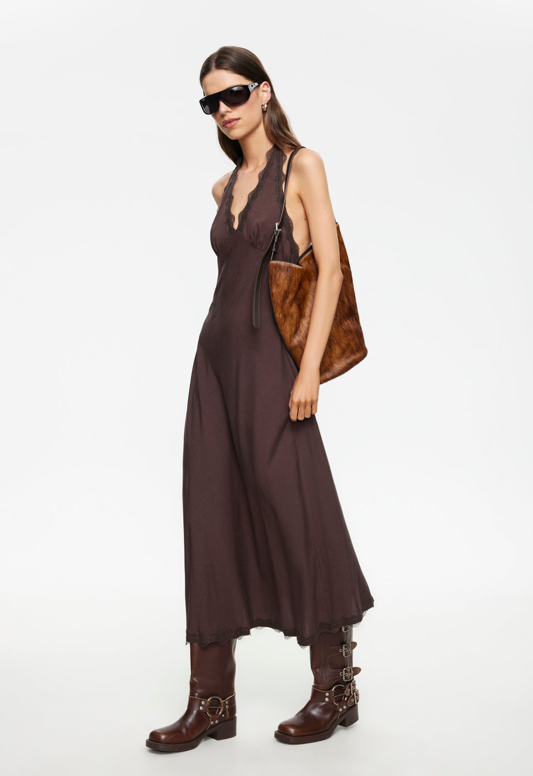 Woman wearing Lioness Stars Align Midi Dress in Brown