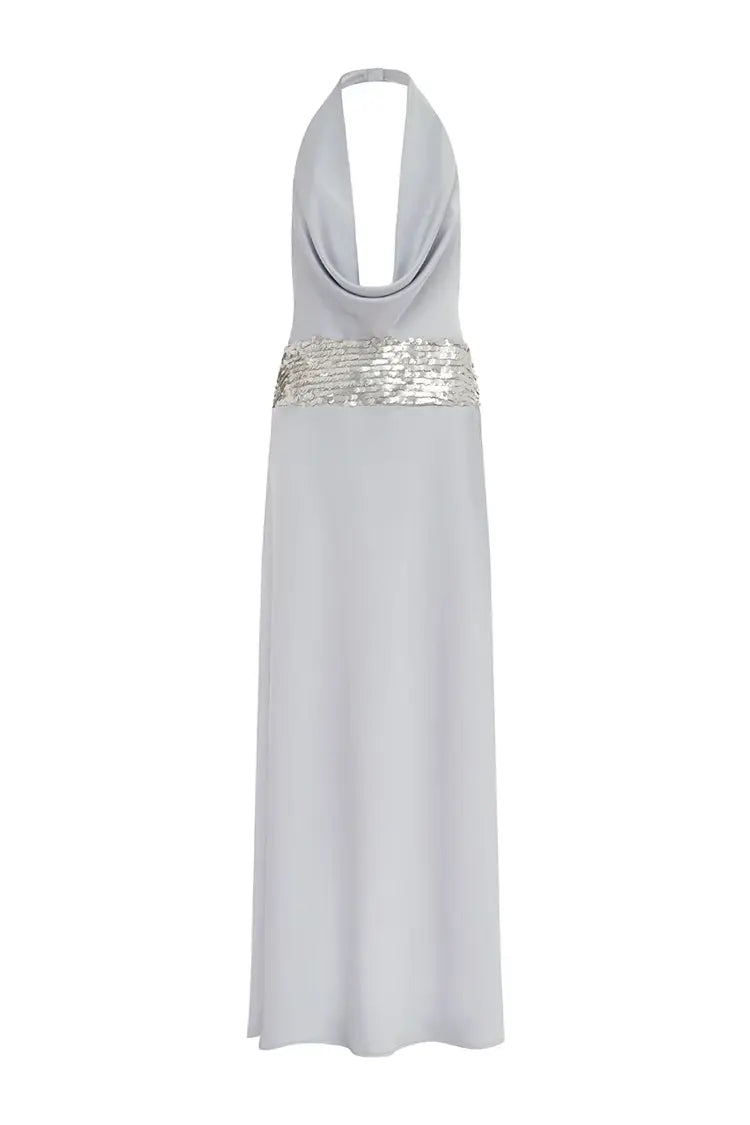 Woman wearing Runaway The Label Marcella Deep Plunge Maxi Dress in Silver