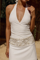 Rumi Faux Wrap Halter Mini Dress in White by Runaway The Label | Winsome Girl Fashion 