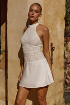 Senna Halter Open Back Mini Dress in White by Runaway The Label | Winsome Girl Fashion 